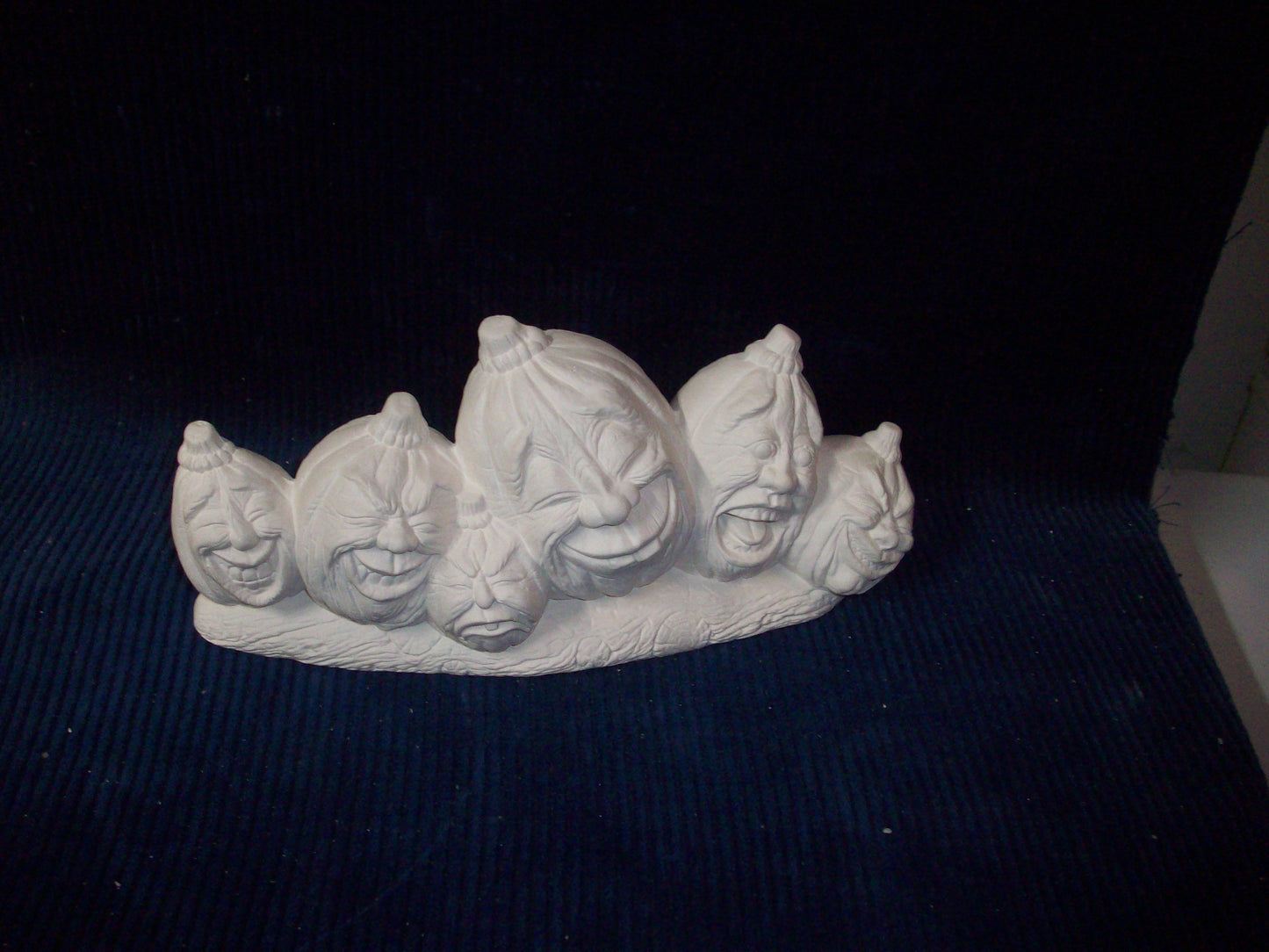 Ceramic Ready To Paint Halloween Role of 6 Pumpkins on a Logw/different Face Features