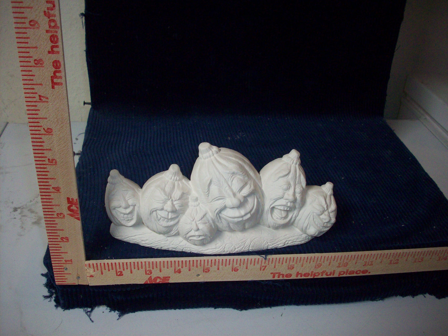 Ceramic Ready To Paint Halloween Role of 6 Pumpkins on a Logw/different Face Features