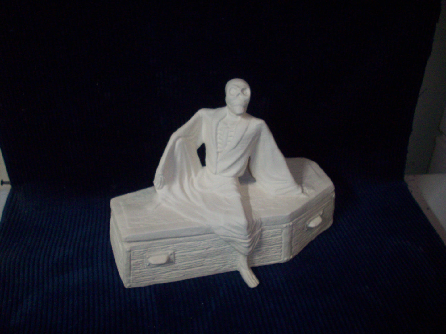 Ceramic Ready To Paint Halloween Skeleton Dressed in a Robe with Coffin