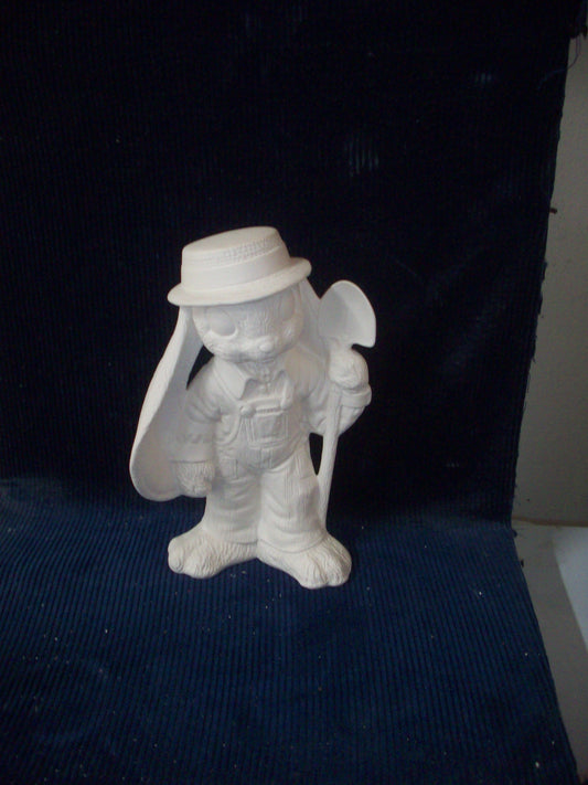 Ceramic Ready To Paint Blue Jean Boy with Floppy Ears and Shovel