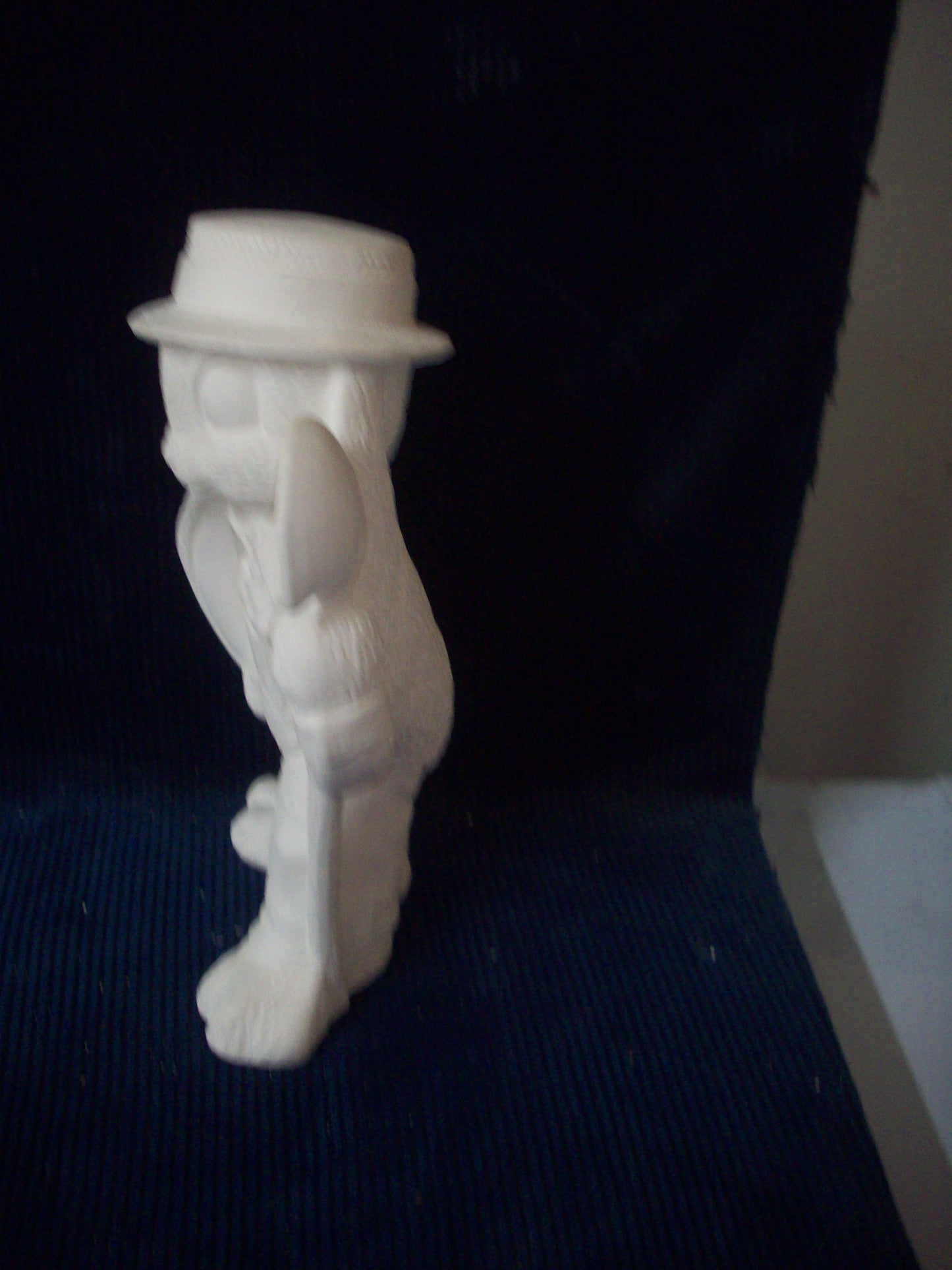 Ceramic Ready To Paint Blue Jean Boy with Floppy Ears and Shovel