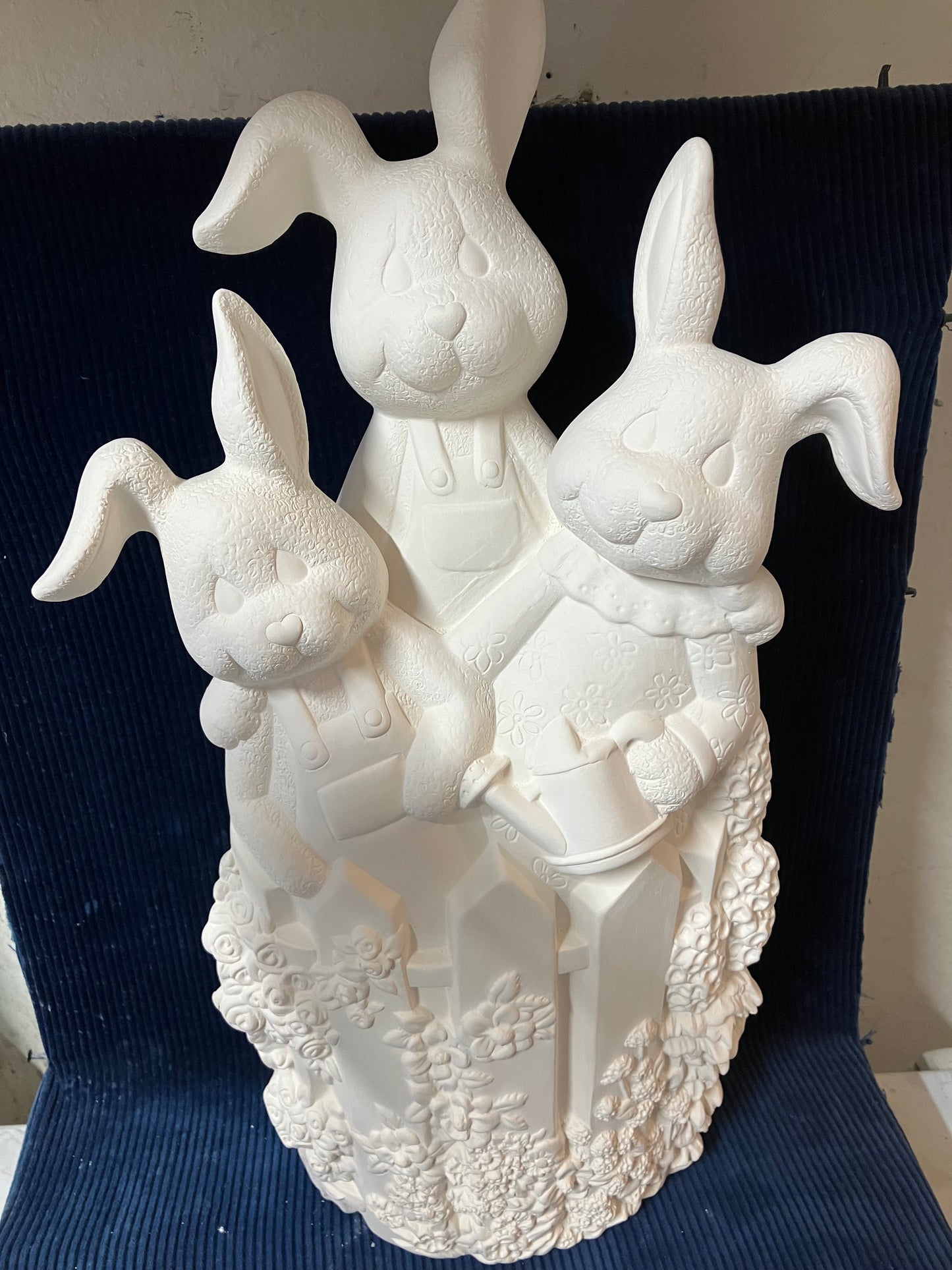 Ceramic ready to paint Bunnies on fence