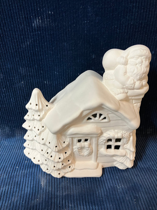 Ceramic Ready To Paint North Pole House with Santa on Chimney